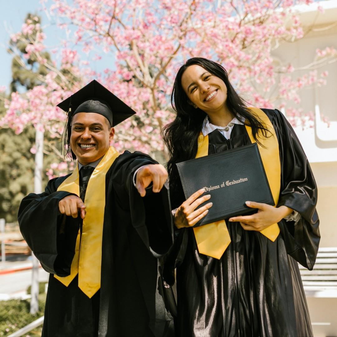 Man & woman graduating