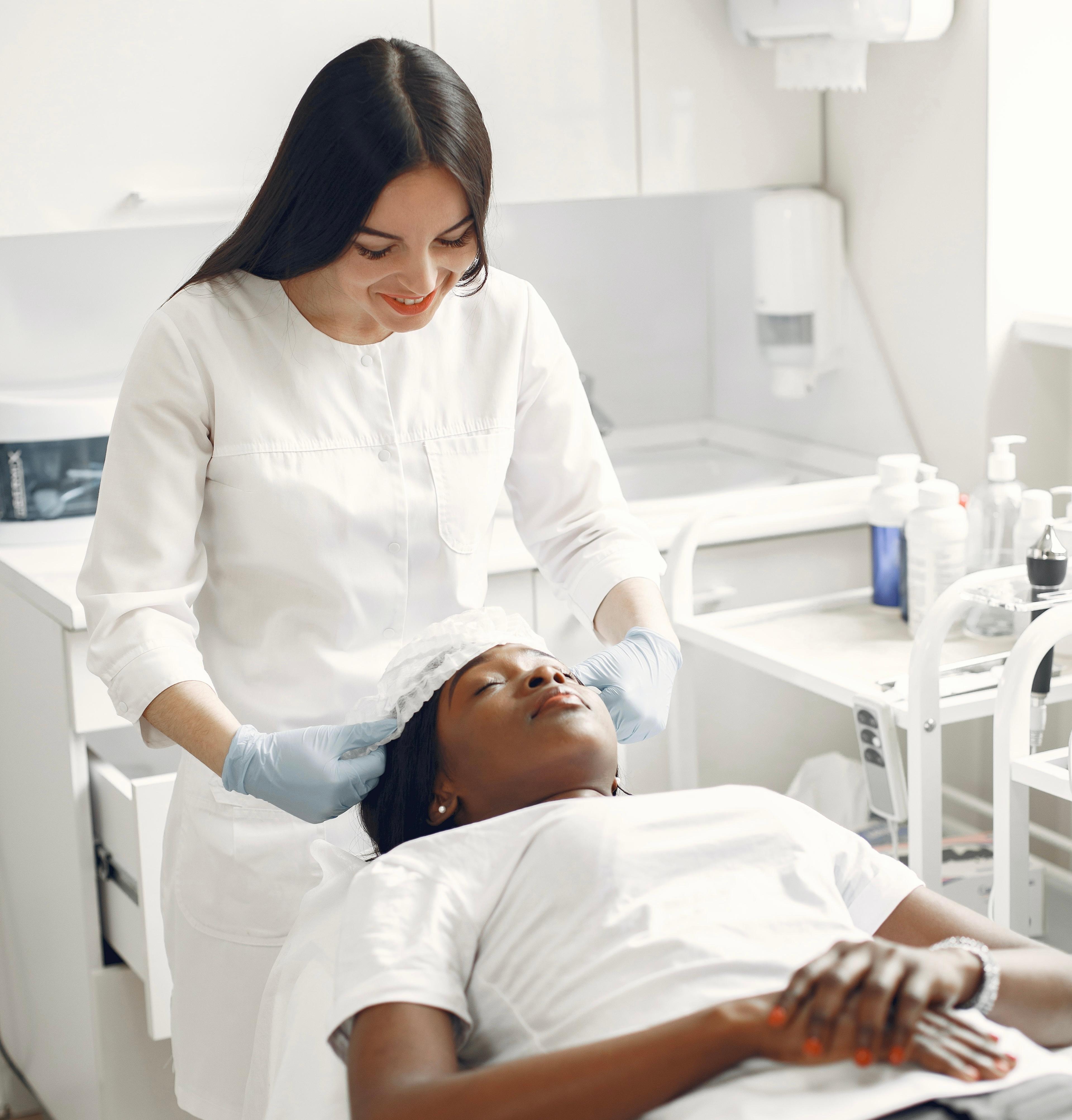 Nurse treating patient